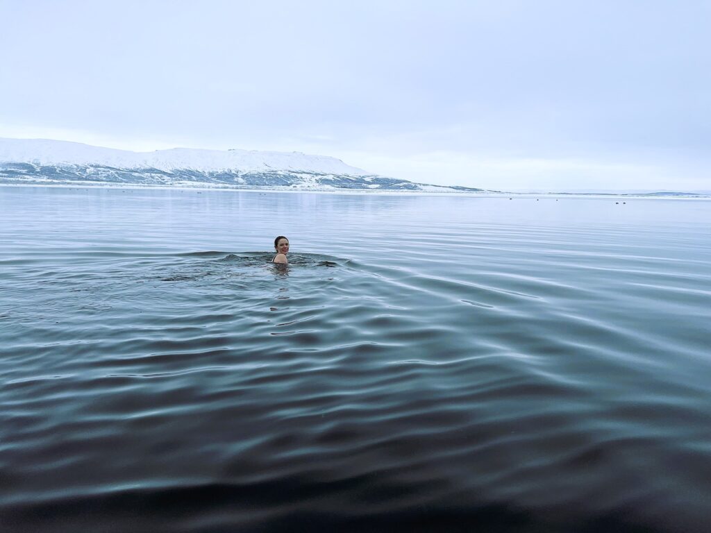 Elaina swimming in a cold water lake 