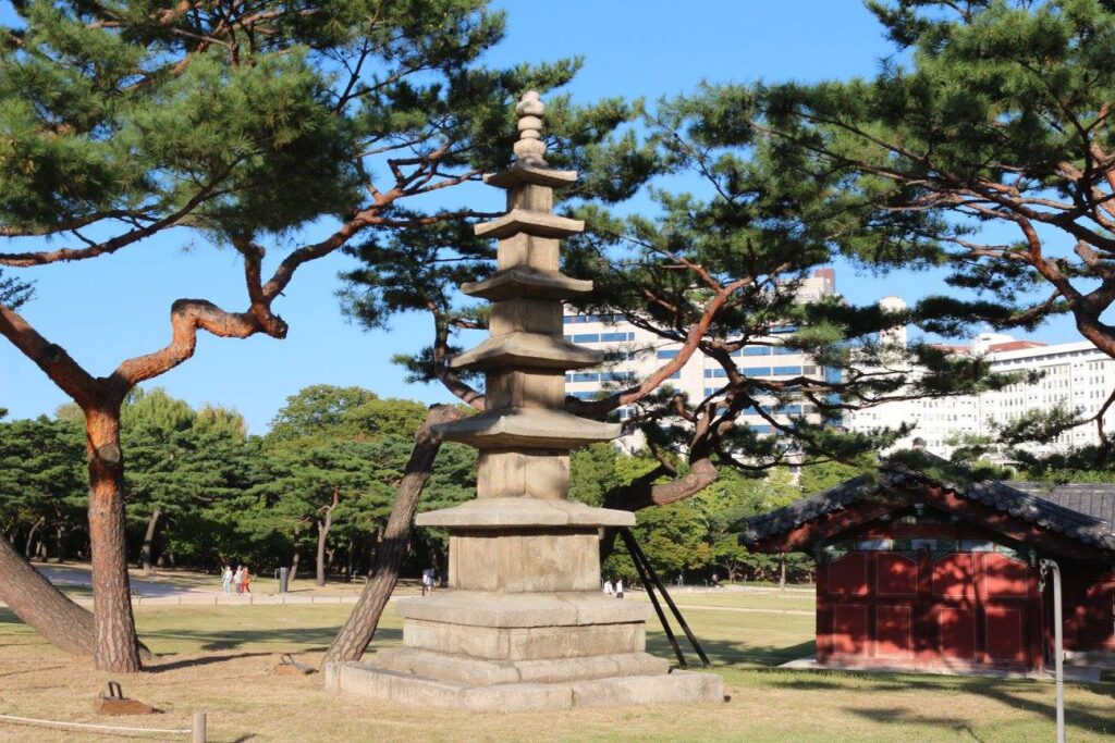 A pagoda in a park with trees