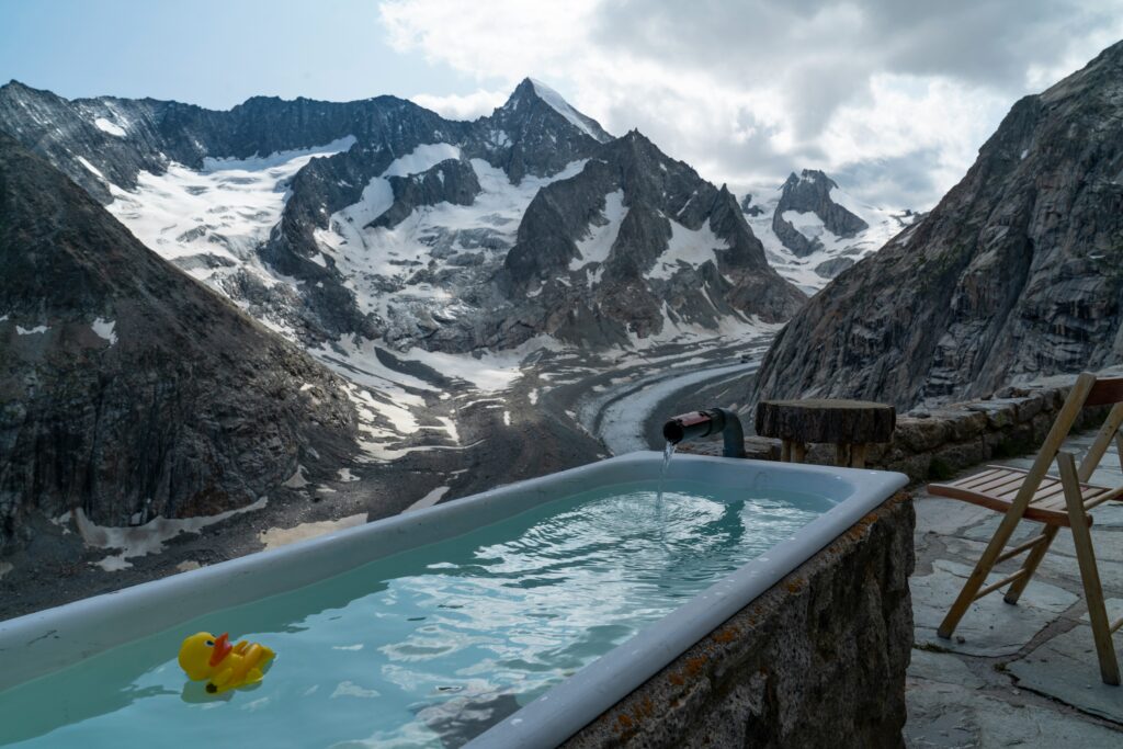 ice bath cold plunge in the snowy mountains